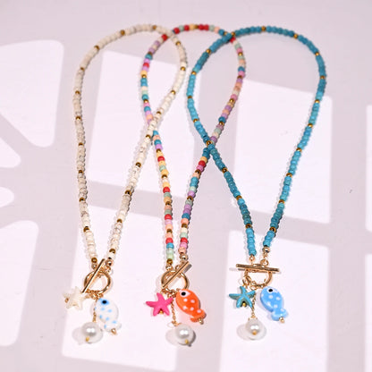 Bohemian Sea-Inspired Ceramic Fish & Starfish Pendant Necklace with 4mm Synthetic Turquoise Beads, Lightweight Beach Jewelry