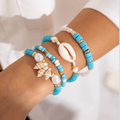 Tocona Bohemian Resort Style Shell Beaded Weaving Bracelet Beach Style Starfish Rice Beads Seven Piece Set for Women 25134