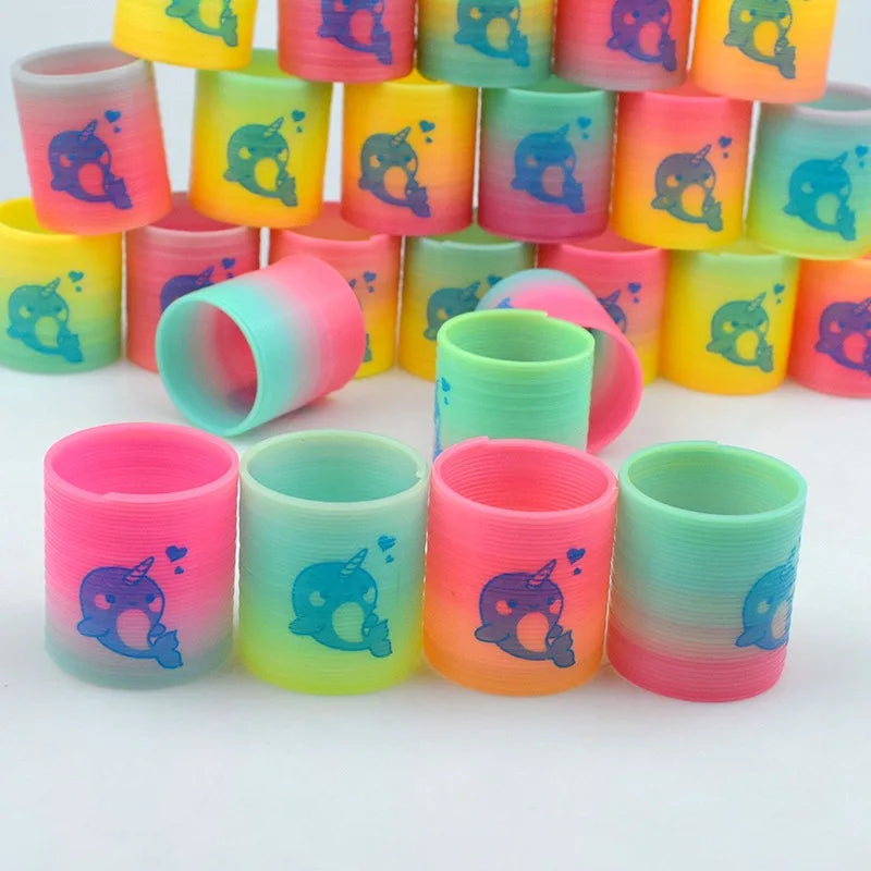 24PCS Rainbow Magic Springs Circle Toys Kids Birthday Party Favors Guests Giveaway Small Gifts Pinata Fillers Flexible Funny 