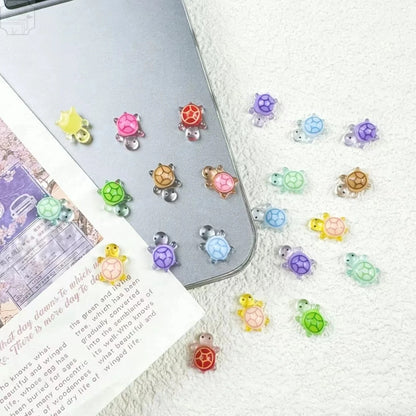 100Pcs Mini Resin Turtles Night Glow Turtle Figurines Multi-Function Glow in The Night Turtle Miniatures for Micro Landscapin