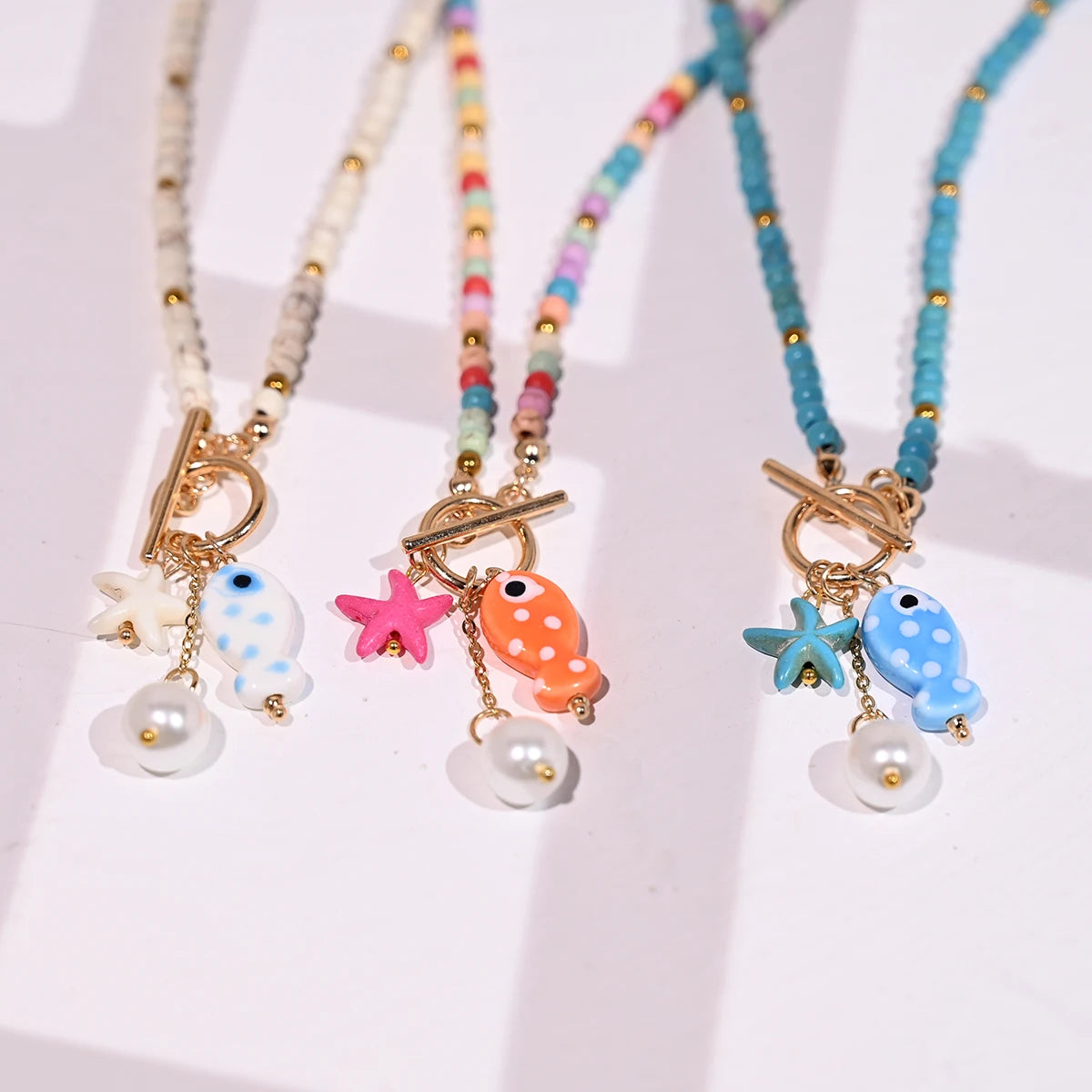 Bohemian Sea-Inspired Ceramic Fish & Starfish Pendant Necklace with 4mm Synthetic Turquoise Beads, Lightweight Beach Jewelry