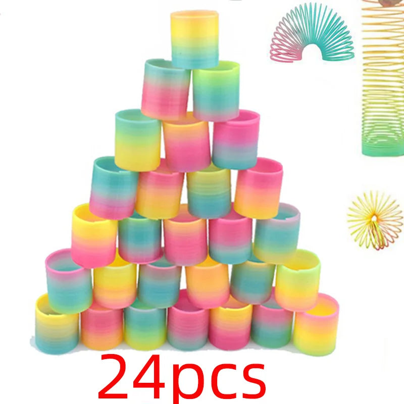 24PCS Rainbow Magic Springs Circle Toys Kids Birthday Party Favors Guests Giveaway Small Gifts Pinata Fillers Flexible Funny 
