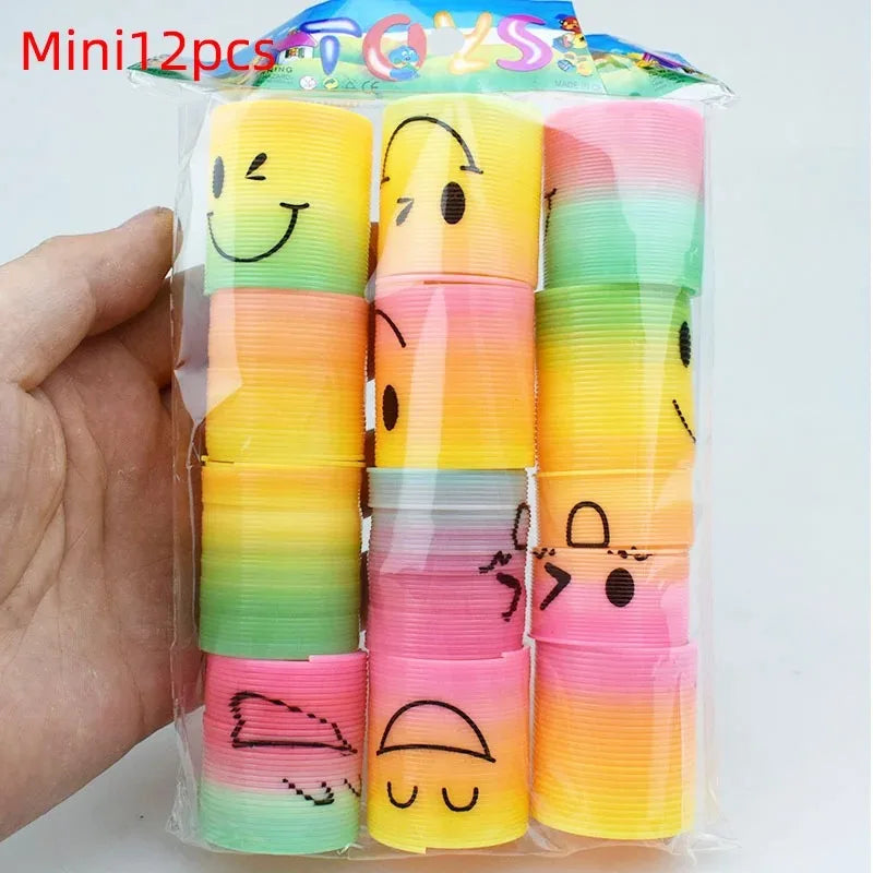 24PCS Rainbow Magic Springs Circle Toys Kids Birthday Party Favors Guests Giveaway Small Gifts Pinata Fillers Flexible Funny 