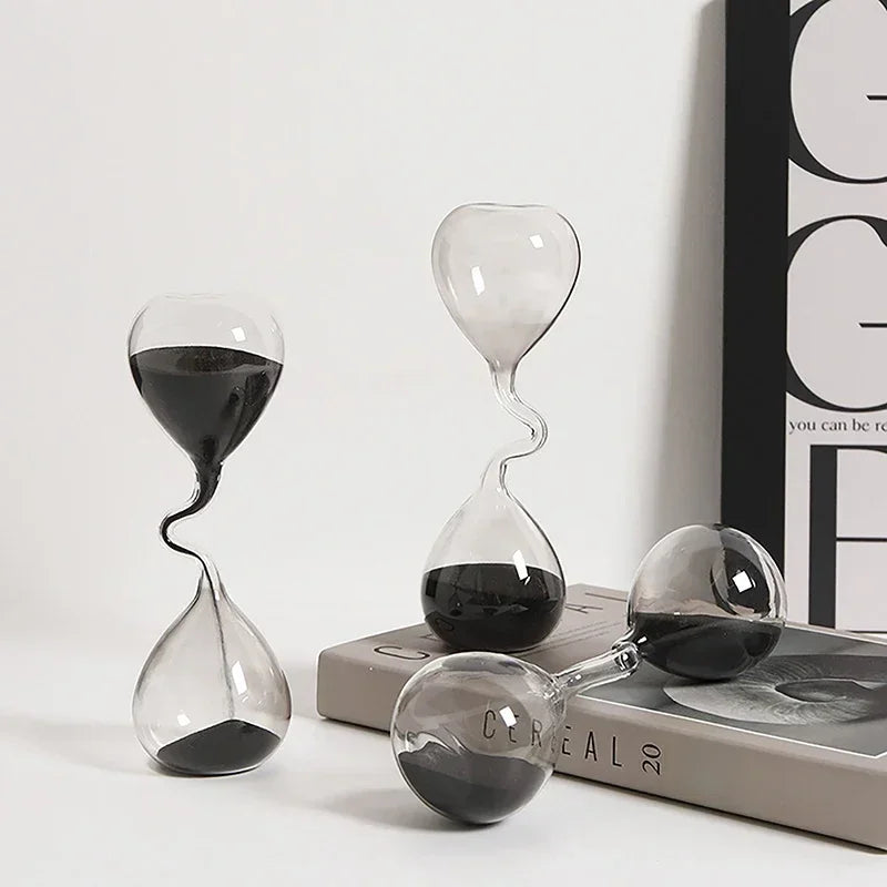Minimalist Interior Dining Table Decoration with Black Modern Style Curved Design and Hourglass Glass Craftsmanship
