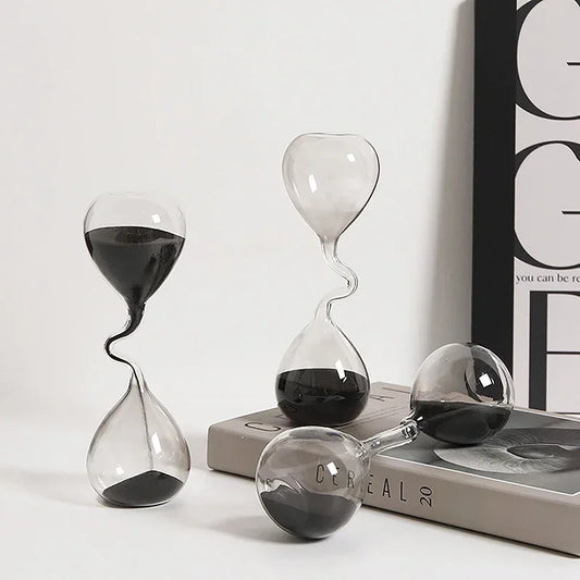 Minimalist Interior Dining Table Decoration with Black Modern Style Curved Design and Hourglass Glass Craftsmanship