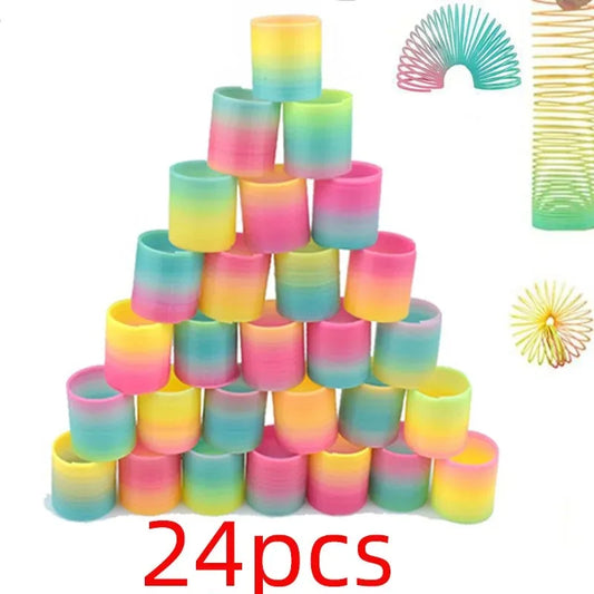 24PCS Rainbow Magic Springs Circle Toys Kids Birthday Party Favors Guests Giveaway Small Gifts Pinata Fillers Flexible Funny 