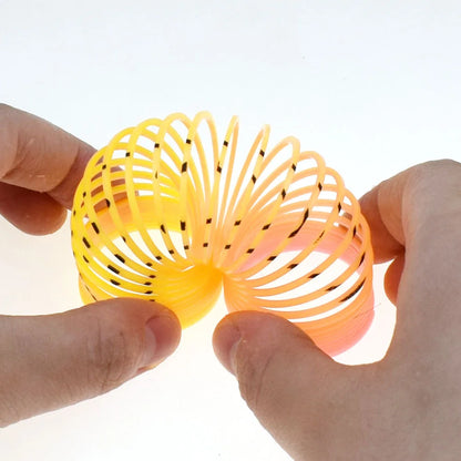 24PCS Rainbow Magic Springs Circle Toys Kids Birthday Party Favors Guests Giveaway Small Gifts Pinata Fillers Flexible Funny 
