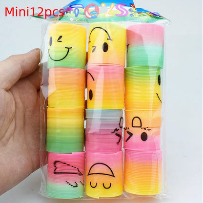 24PCS Rainbow Magic Springs Circle Toys Kids Birthday Party Favors Guests Giveaway Small Gifts Pinata Fillers Flexible Funny 