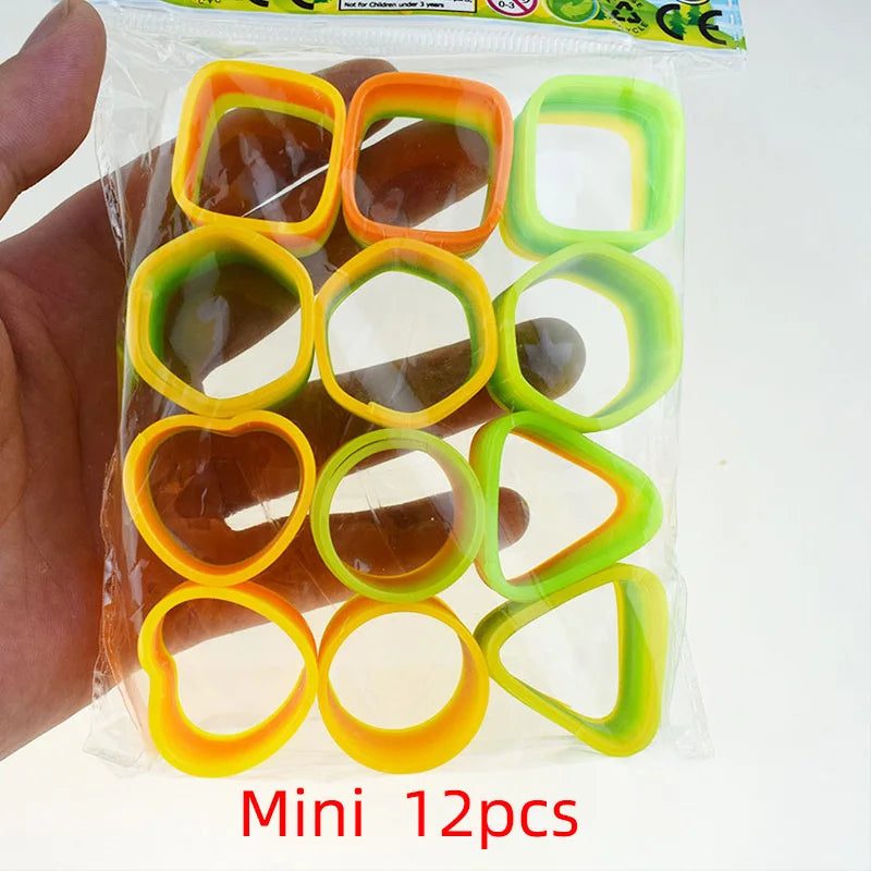 24PCS Rainbow Magic Springs Circle Toys Kids Birthday Party Favors Guests Giveaway Small Gifts Pinata Fillers Flexible Funny 