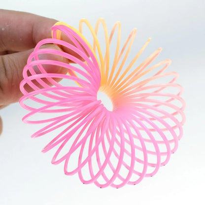 24PCS Rainbow Magic Springs Circle Toys Kids Birthday Party Favors Guests Giveaway Small Gifts Pinata Fillers Flexible Funny 
