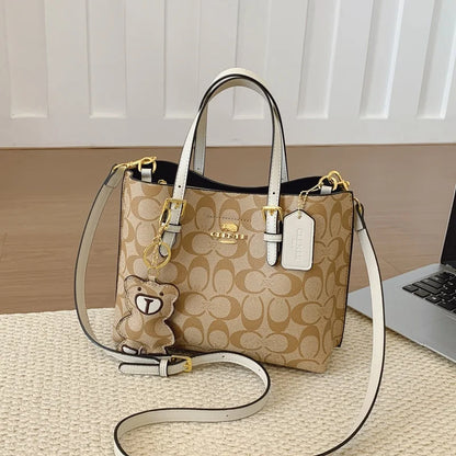 Elegant Monogram Tote Bag in Classic Style for Women Featuring Retro Leather Trim and Detachable Strap