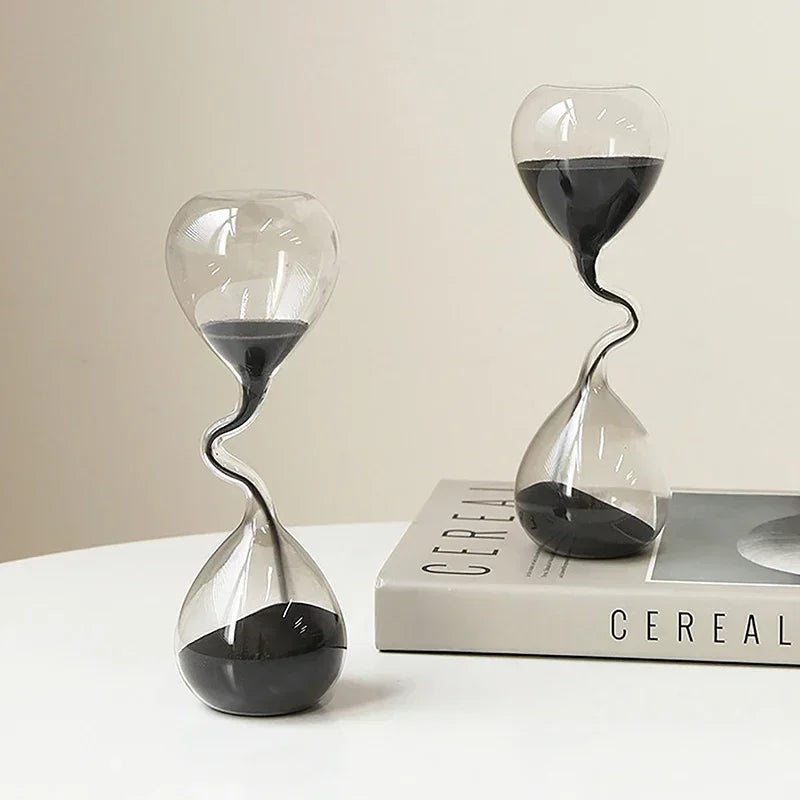 Minimalist Interior Dining Table Decoration with Black Modern Style Curved Design and Hourglass Glass Craftsmanship