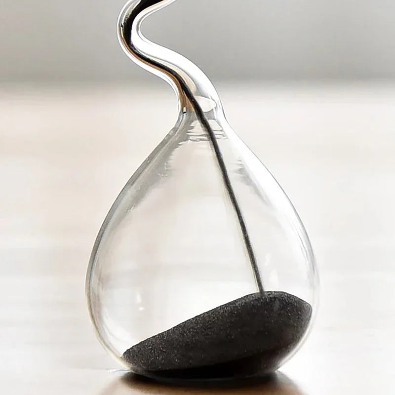 Minimalist Interior Dining Table Decoration with Black Modern Style Curved Design and Hourglass Glass Craftsmanship