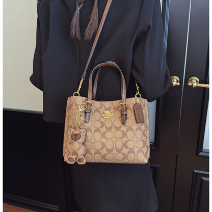 Elegant Monogram Tote Bag in Classic Style for Women Featuring Retro Leather Trim and Detachable Strap